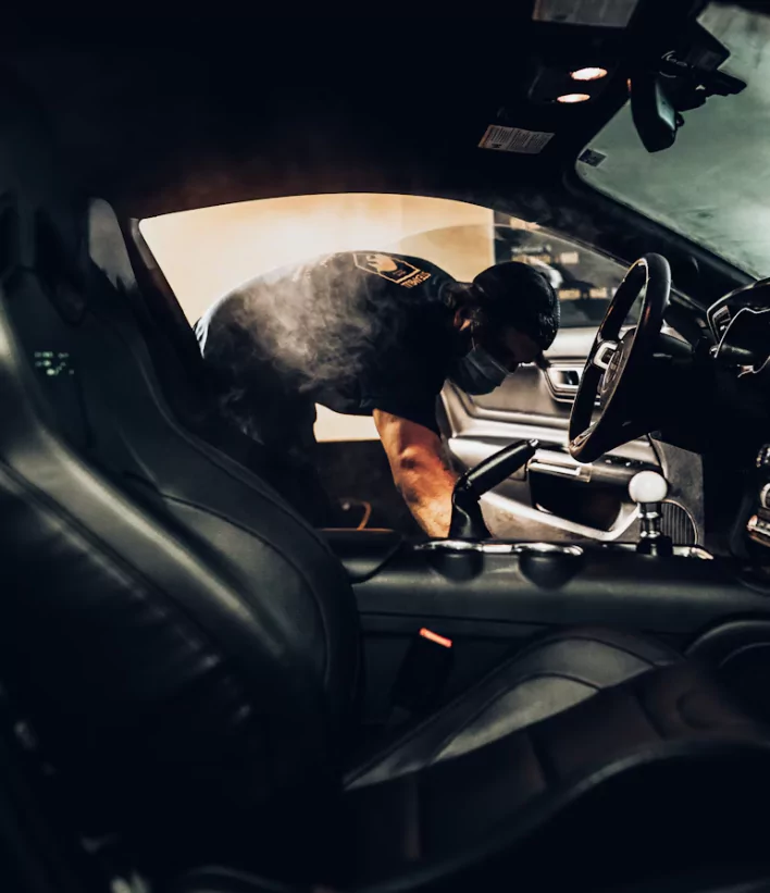 man-cleaning-car